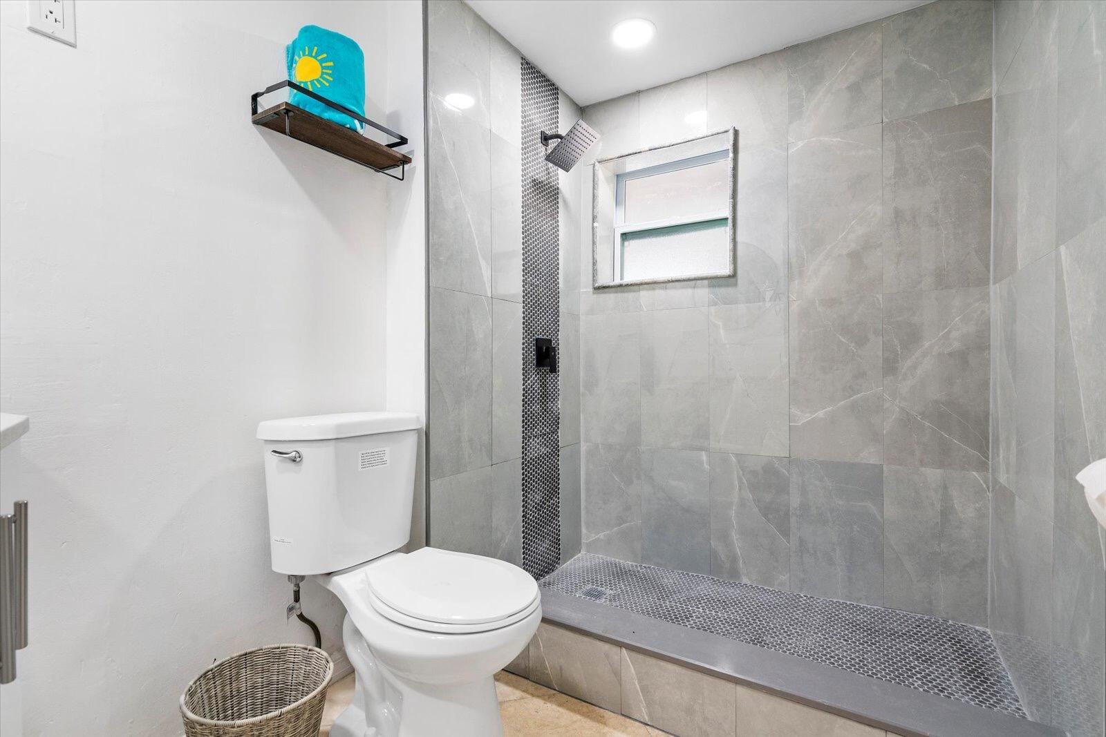 236 Southwest 14th Street Dania Beach, FL 33004 - Photo 14 of 19 a bathroom with a toilet and a shower