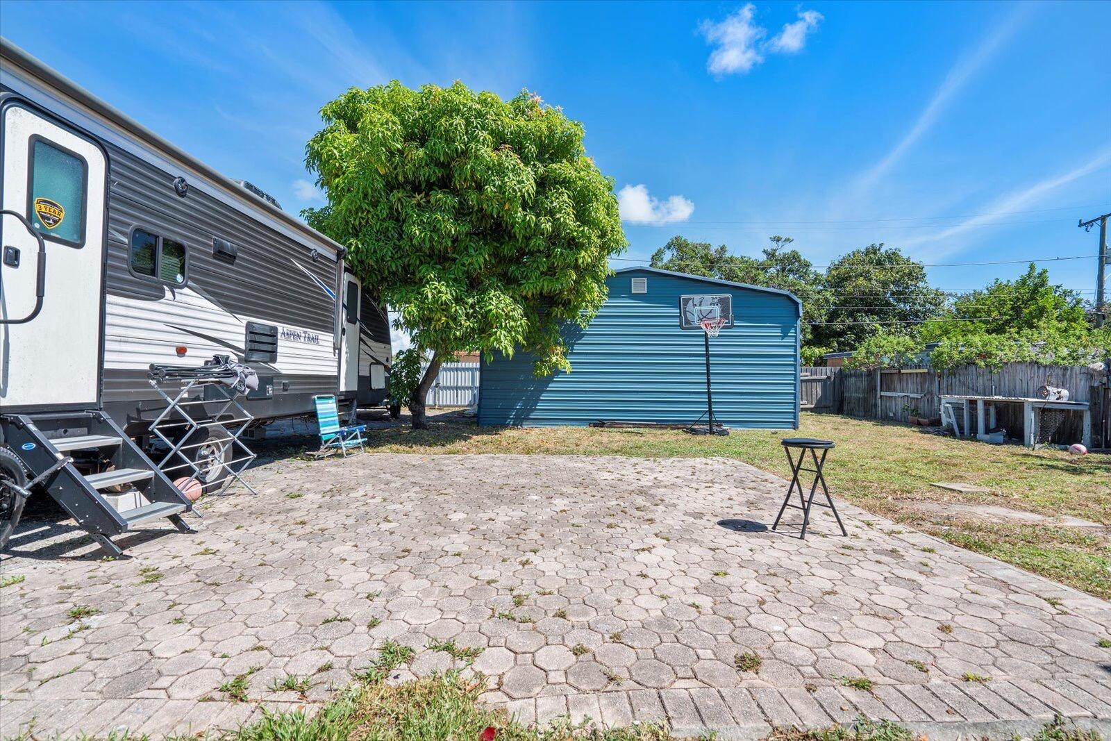 236 Southwest 14th Street Dania Beach, FL 33004 - Photo 18 of 19 a view of backyard of house
