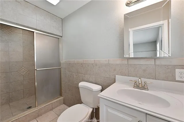 a bathroom with a sink and a toilet