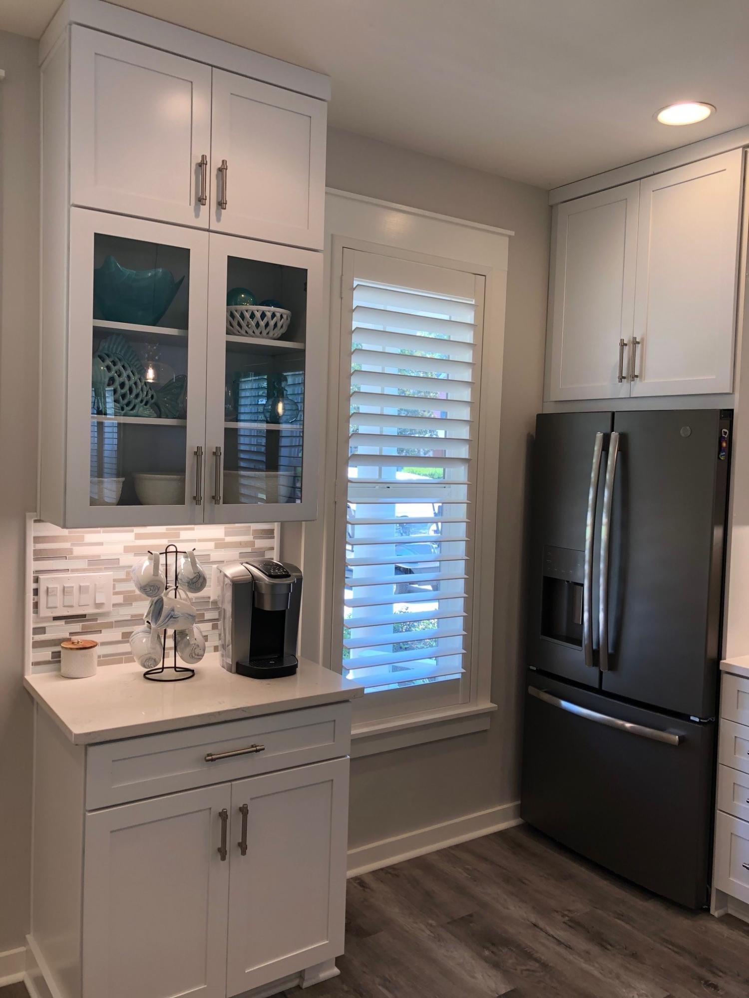 1384 Ravens Run West Miramar Beach, FL 32550 - Photo 14 of 21 a kitchen with a refrigerator and a sink