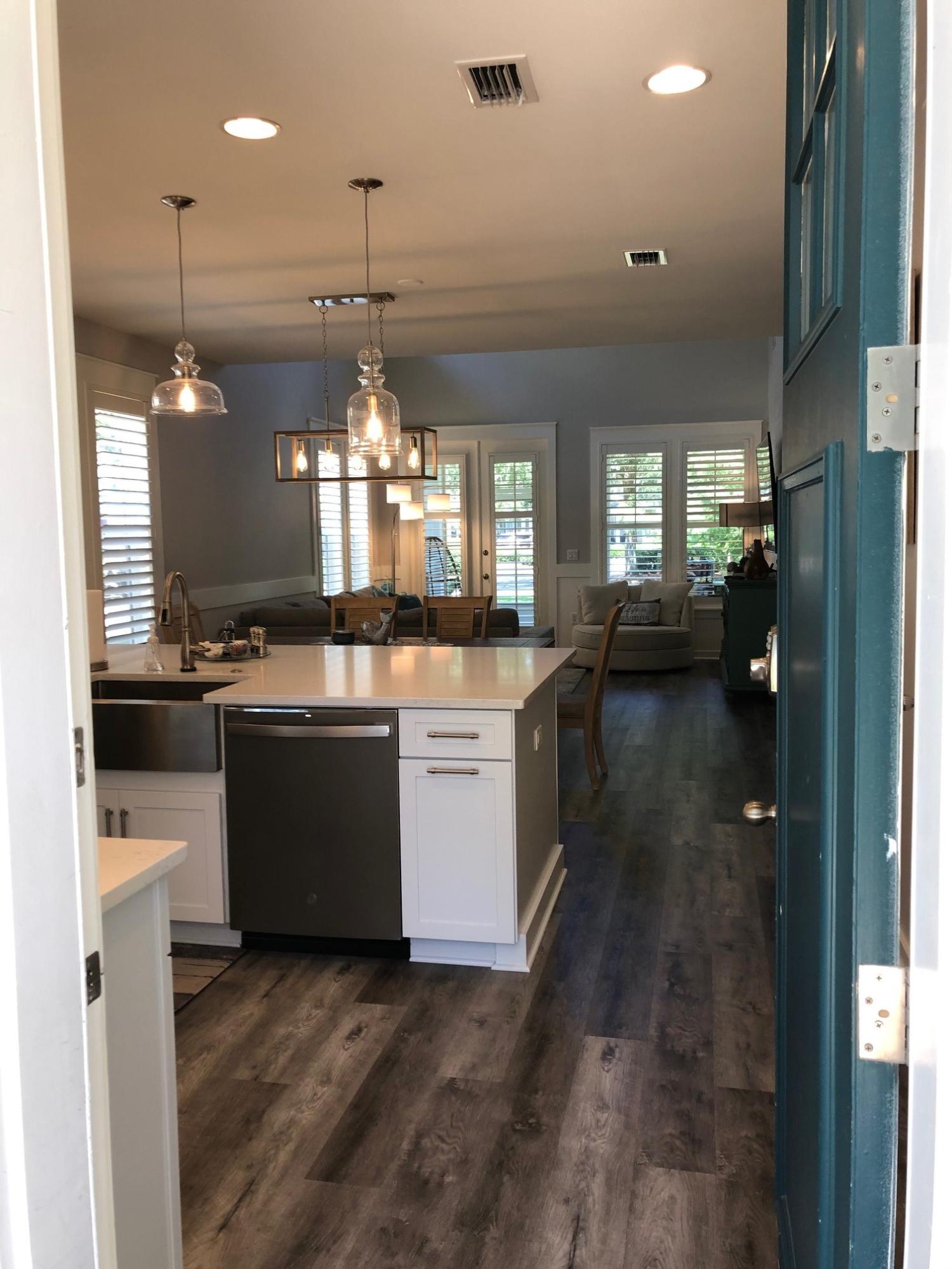 1384 Ravens Run West Miramar Beach, FL 32550 - Photo 5 of 21 a kitchen with a sink stove and cabinets