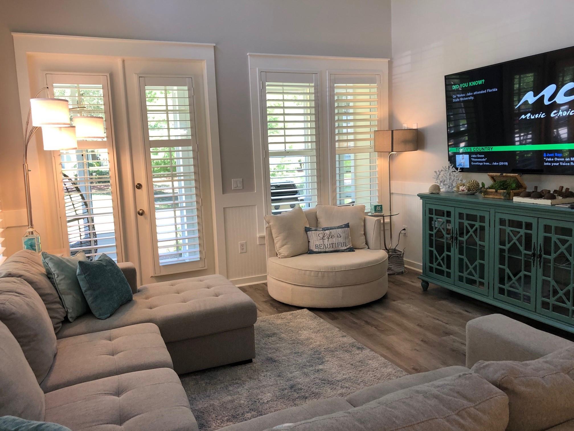 1384 Ravens Run West Miramar Beach, FL 32550 - Photo 6 of 21 a living room with furniture and a flat screen tv