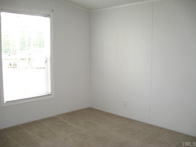4180 Oxford Road Roxboro, NC 27574 - Photo 8 of 12 Second bedroom