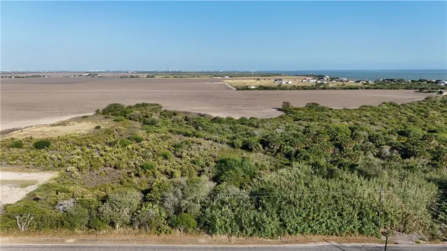 a view of a city with a lake