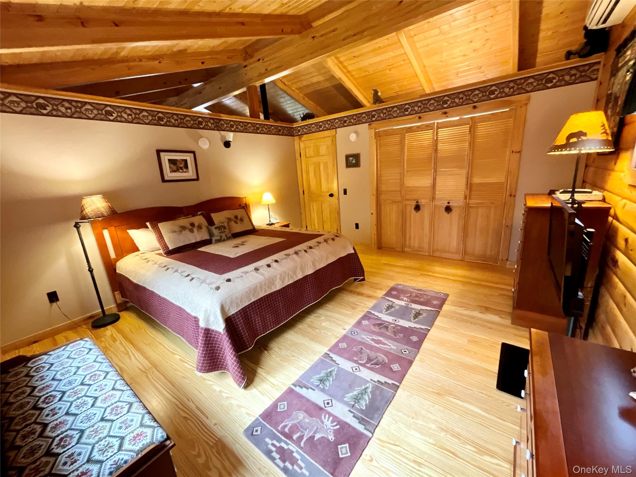 66 Milton Smith Road Long Eddy, NY 12760 - Photo 14 of 25 The bedroom has ample closet space and rustic charm.