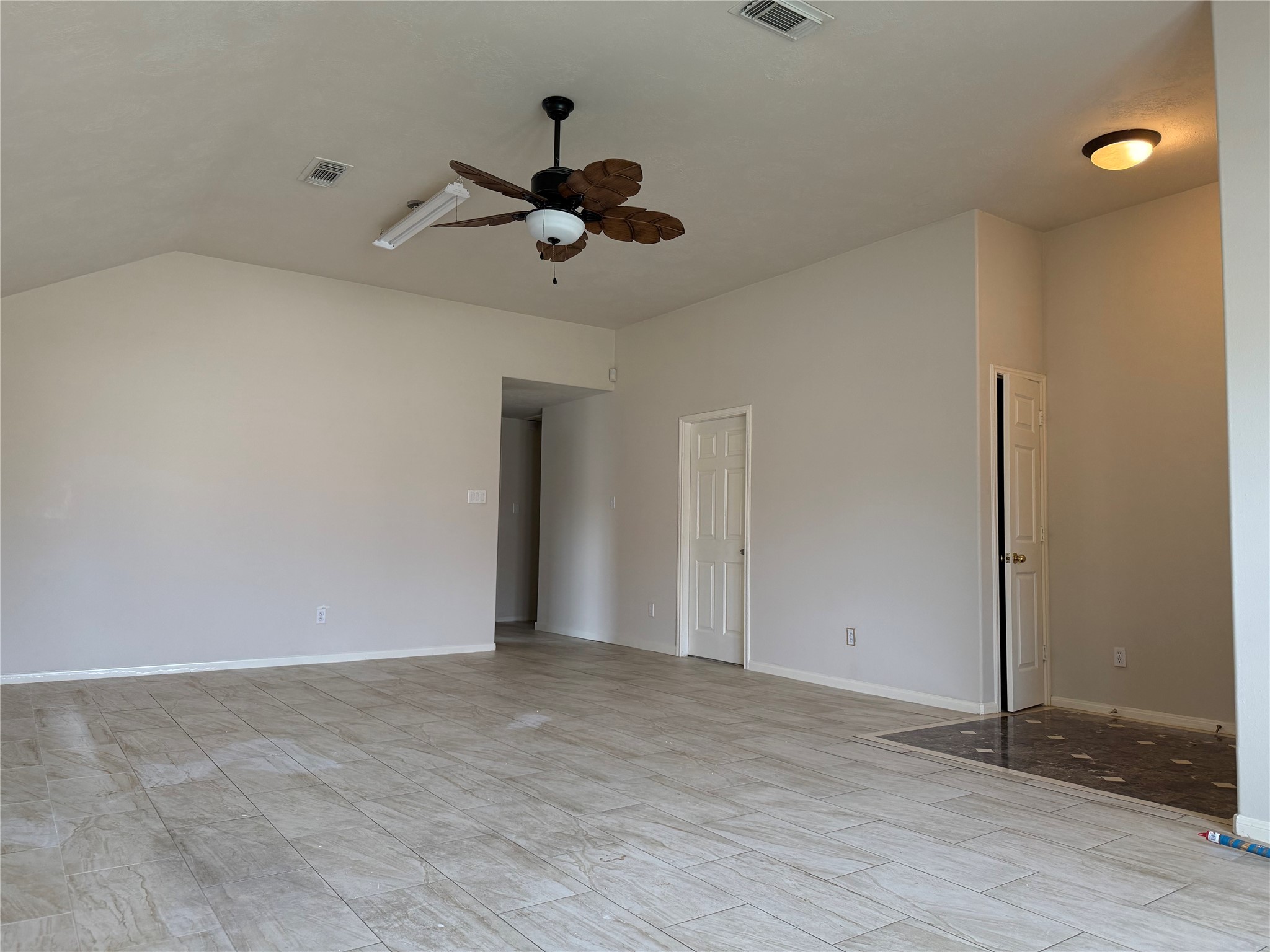 13715 Audra Lane Houston, TX 77083 - Photo 2 of 25 a view of an empty room and window