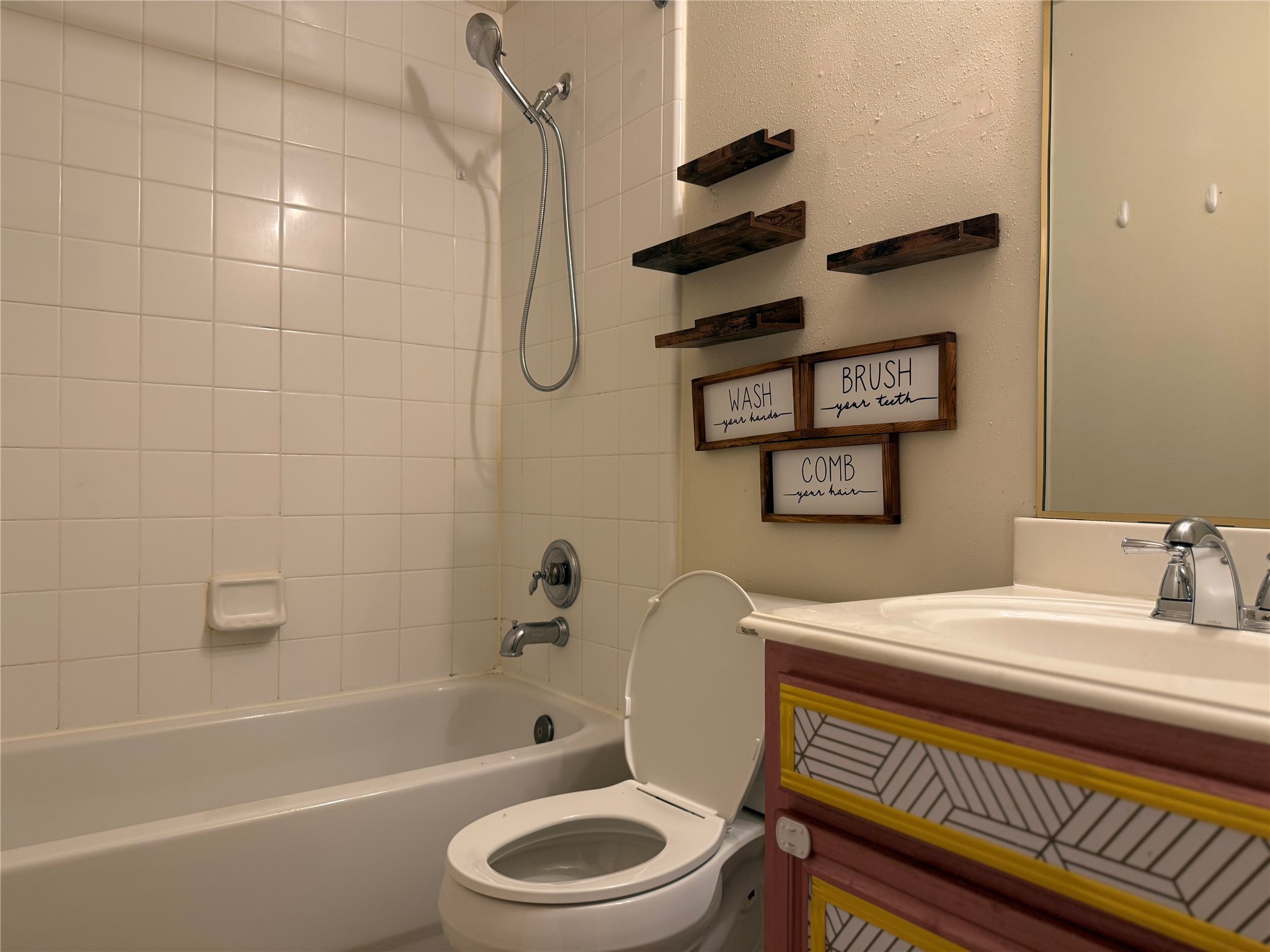 13715 Audra Lane Houston, TX 77083 - Photo 21 of 25 a bathroom with a sink a toilet and shower