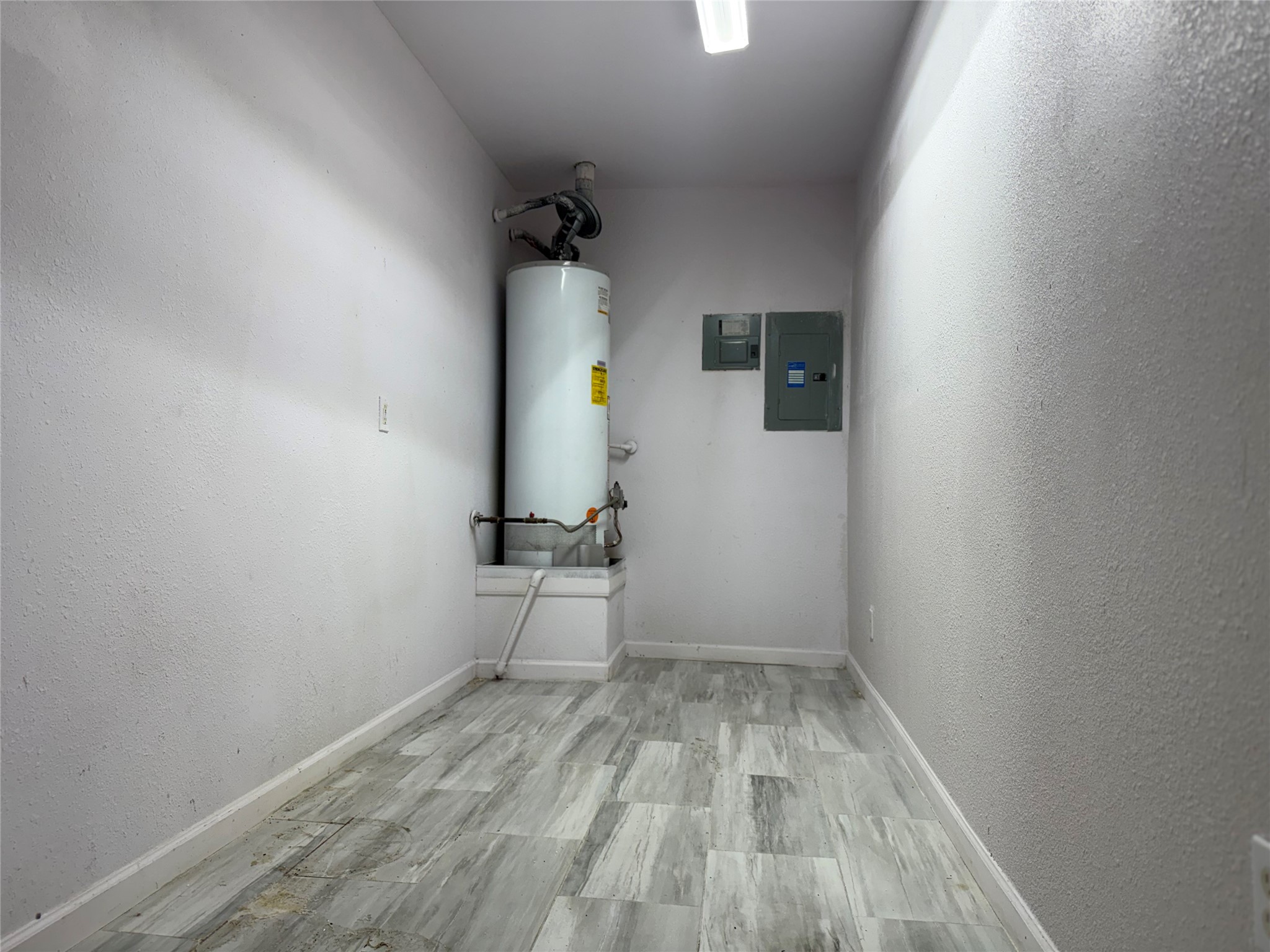 13715 Audra Lane Houston, TX 77083 - Photo 23 of 25 a view of empty room with wooden floor and fan