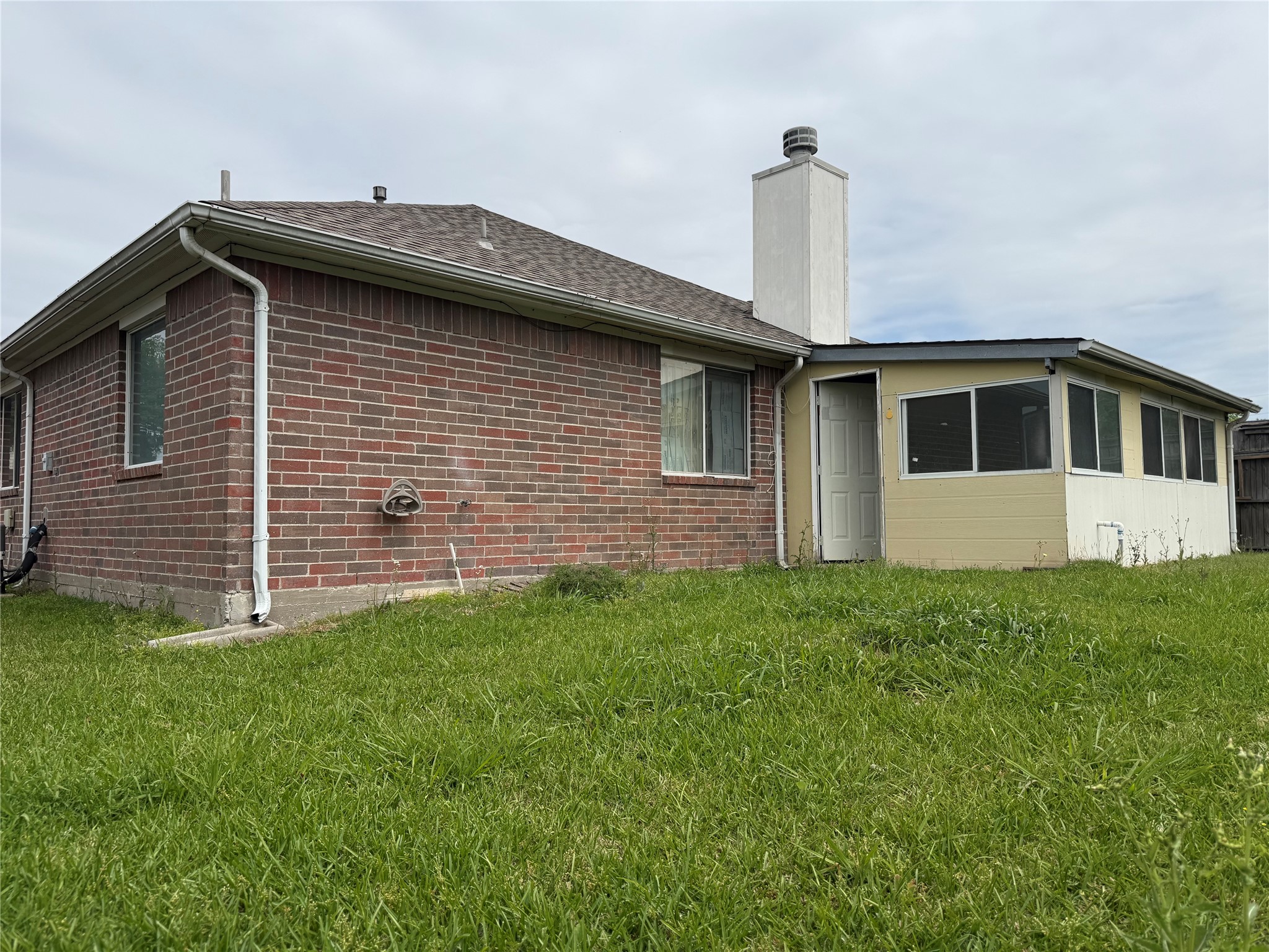 13715 Audra Lane Houston, TX 77083 - Photo 25 of 25 a front view of a house with garden