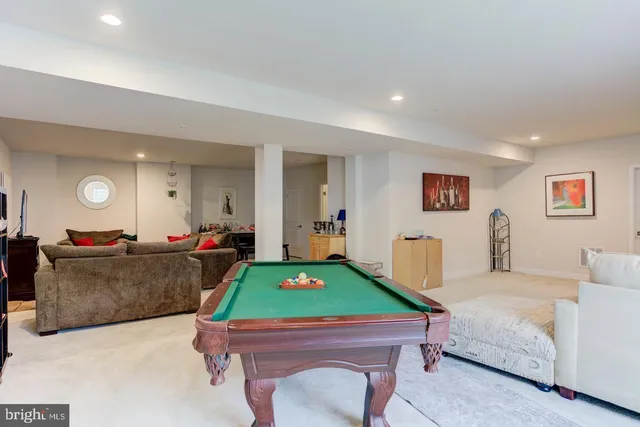 a room with furniture and a flat screen tv