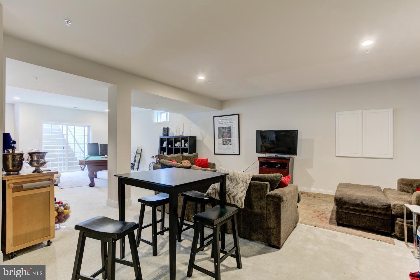 4902 Bridle Ridge Road Upper Marlboro, MD 20772 - Photo 15 of 20 a living room with furniture and a flat screen tv