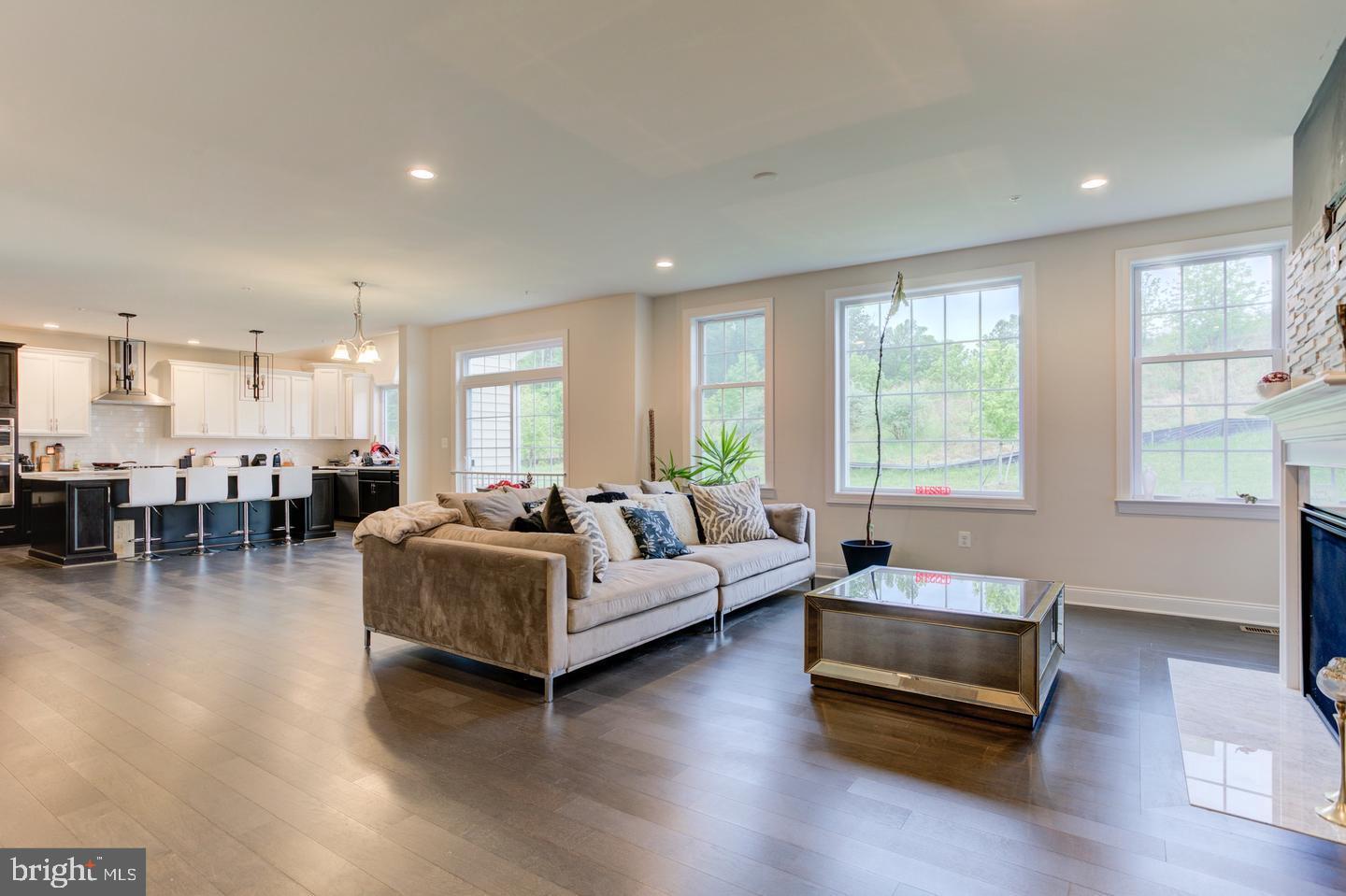 4902 Bridle Ridge Road Upper Marlboro, MD 20772 - Photo 4 of 20 a living room with furniture and a large window