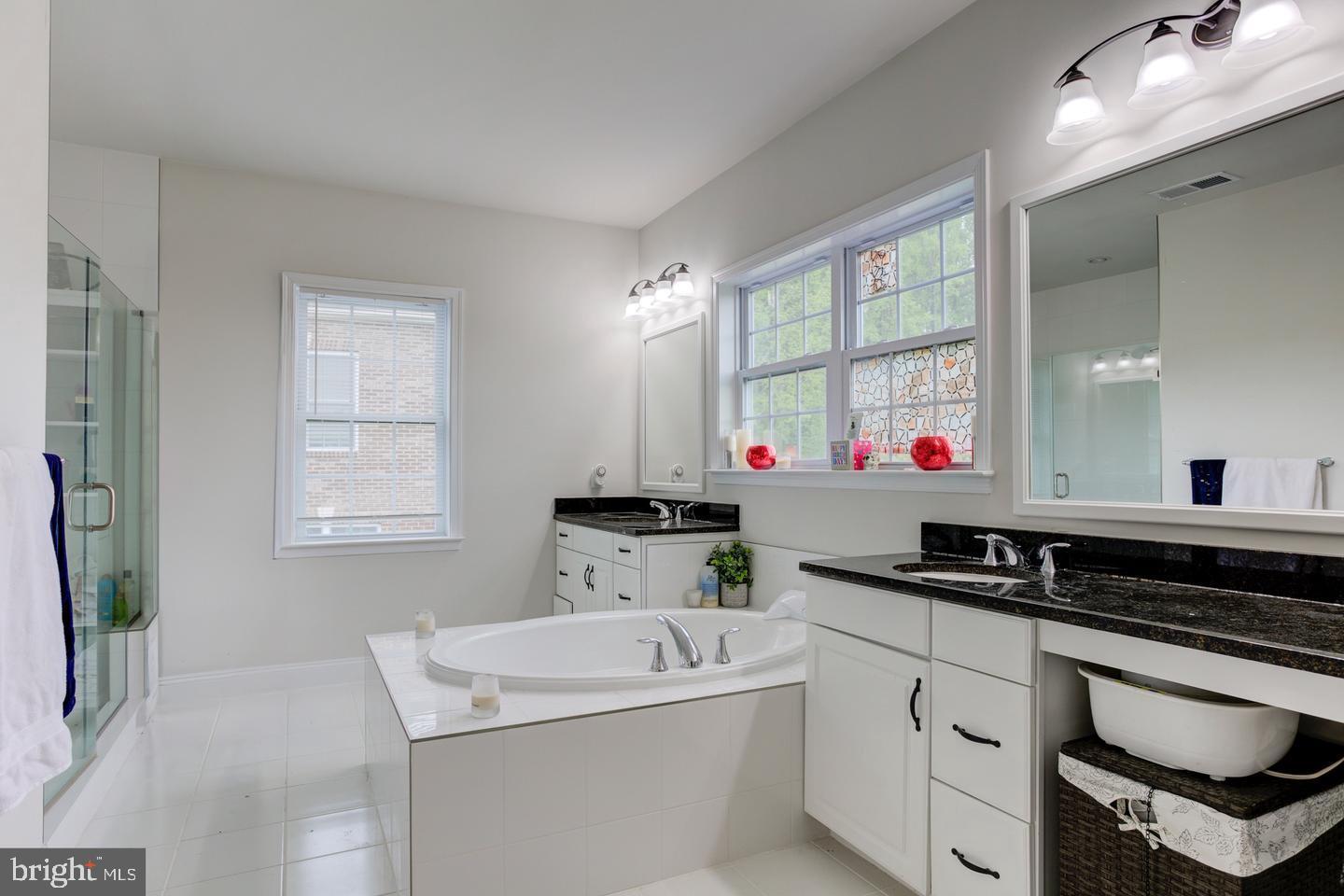4902 Bridle Ridge Road Upper Marlboro, MD 20772 - Photo 8 of 20 a kitchen with a sink stove and cabinets