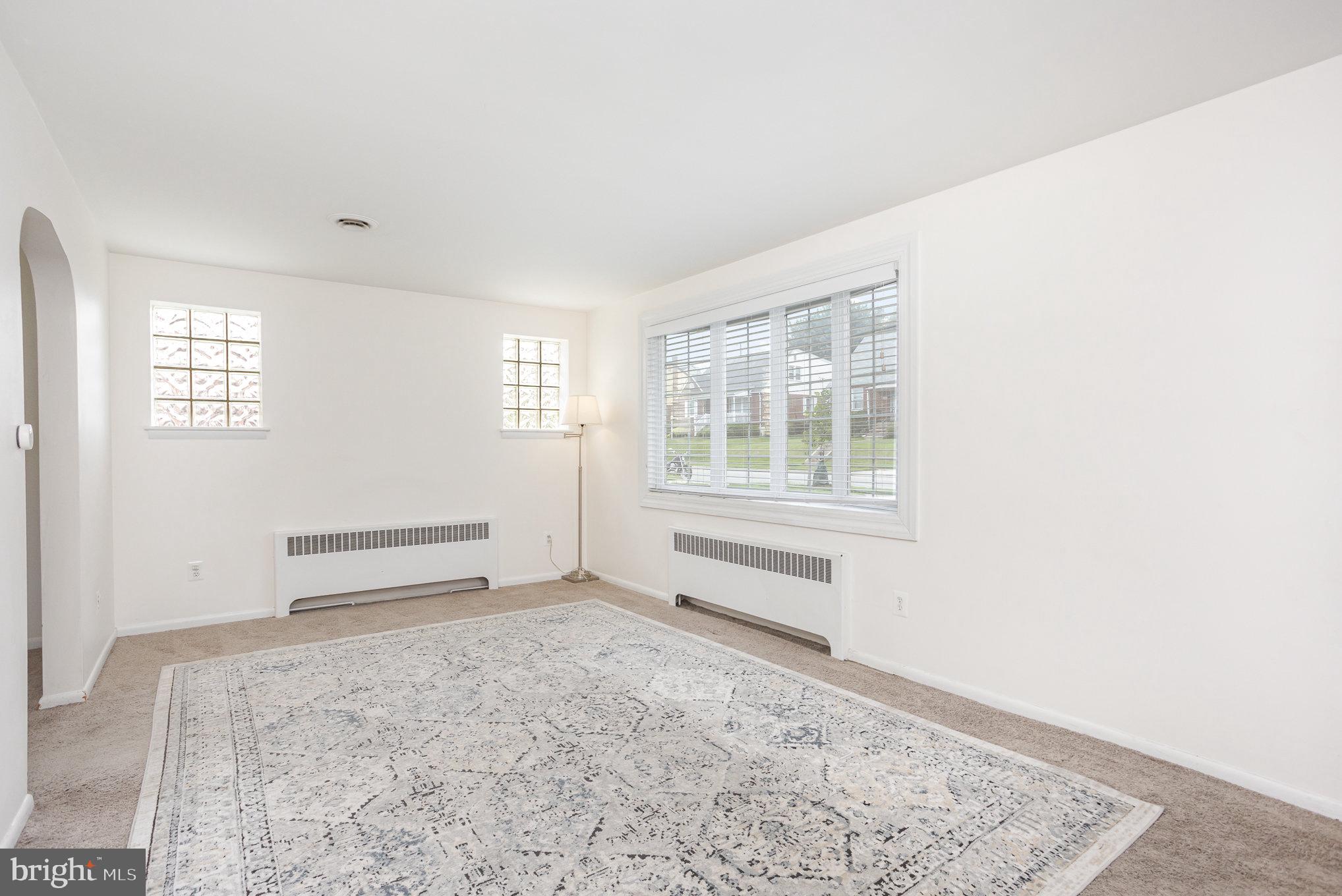 8223 Analee Avenue Rosedale, MD 21237 - Photo 4 of 37 a view of an empty room with a window