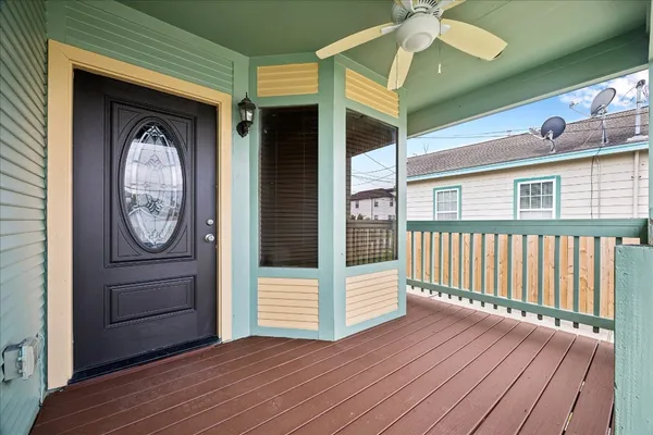 a view of a door and wooden floor