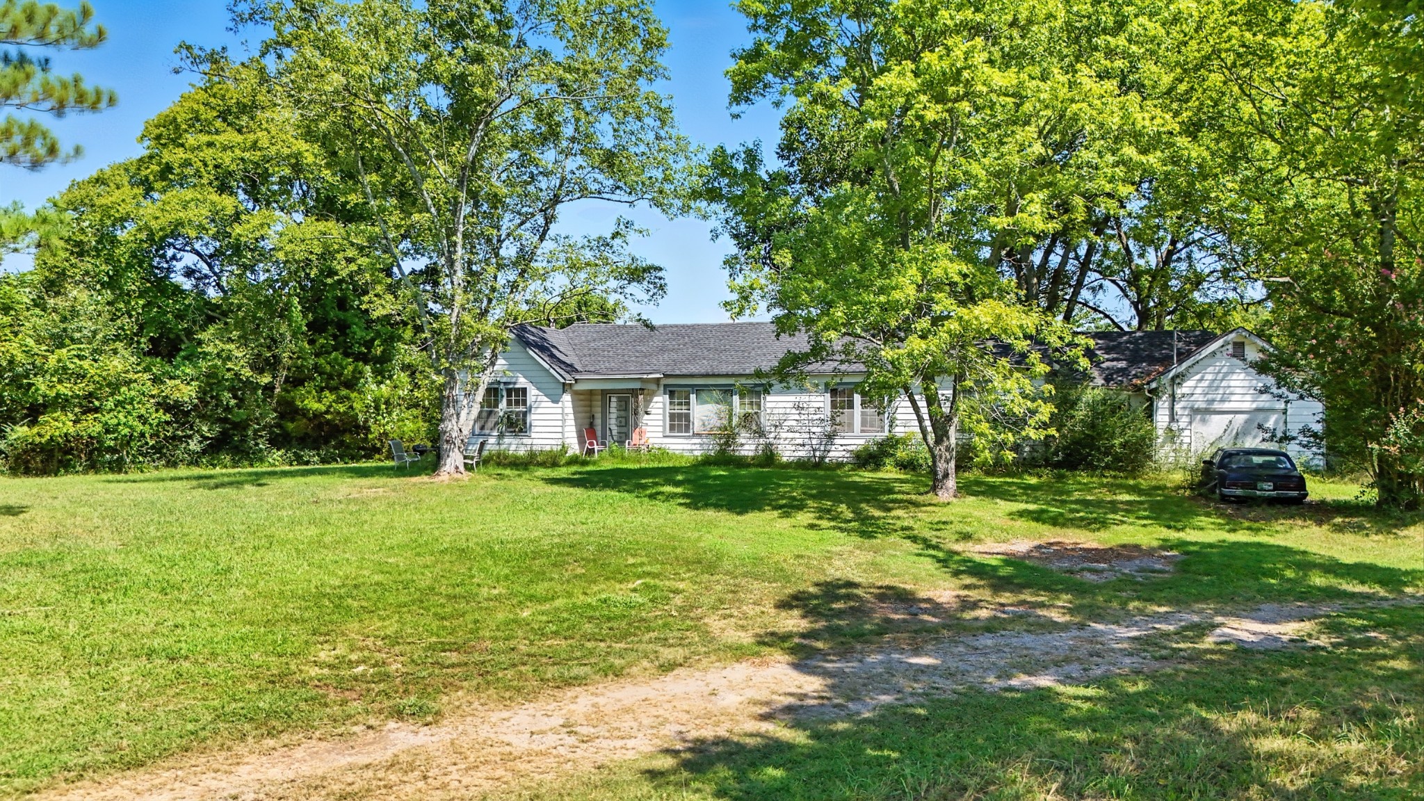 790 Squire Hall Road Bell Buckle, TN 37020 - Photo 34 of 42 a front view of a house with a yard