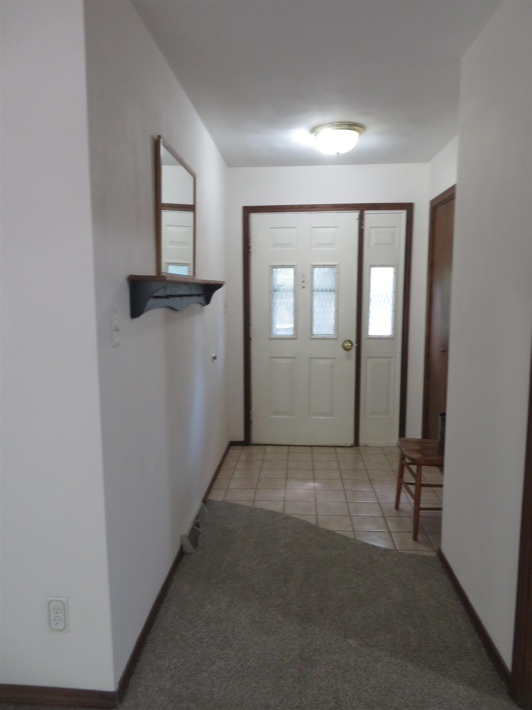 706 Quail Ridge Drive Freeport, IL 61032 - Photo 2 of 21 an empty room with windows