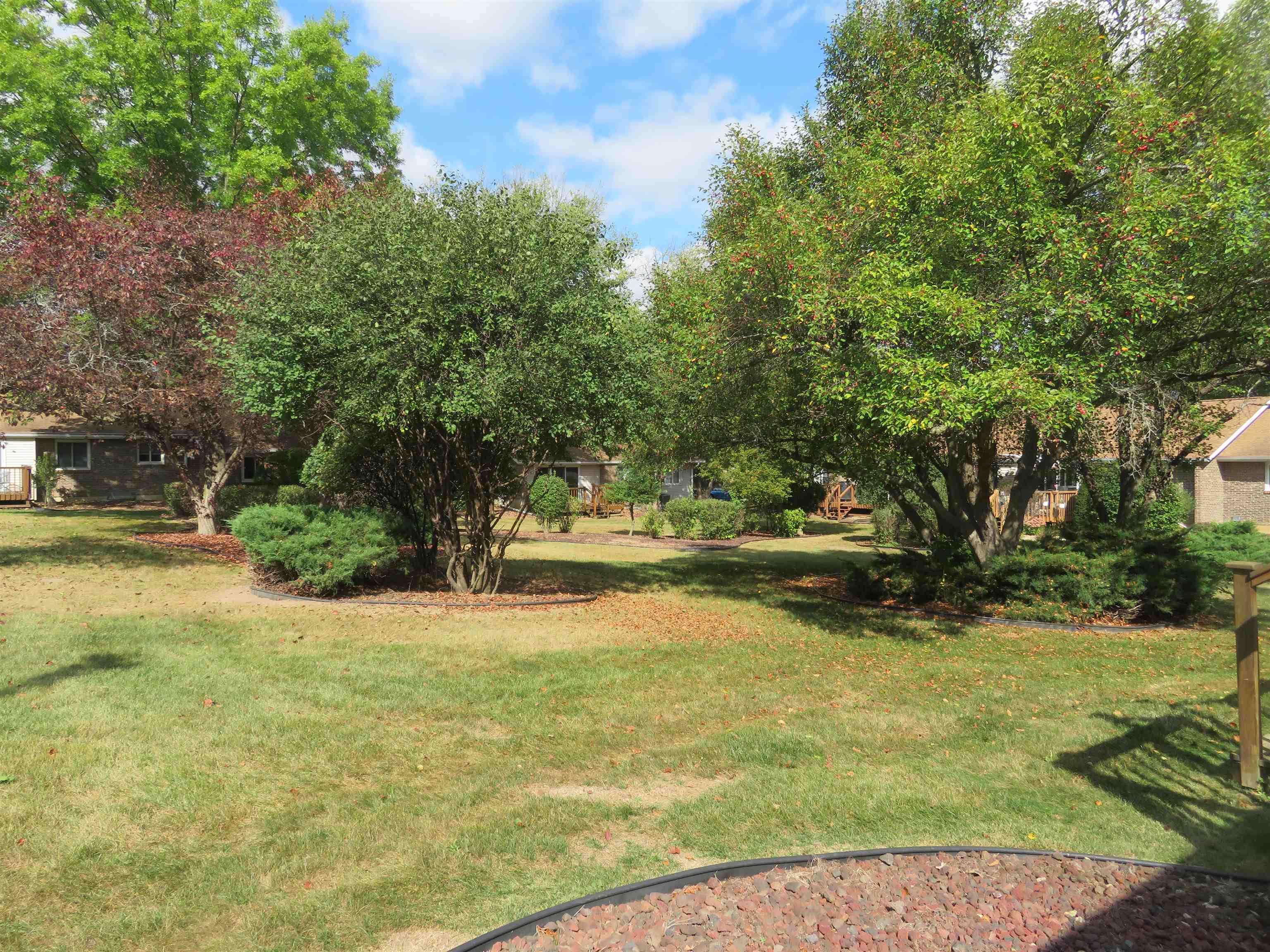 706 Quail Ridge Drive Freeport, IL 61032 - Photo 21 of 21 a view of yard with swimming pool and green space