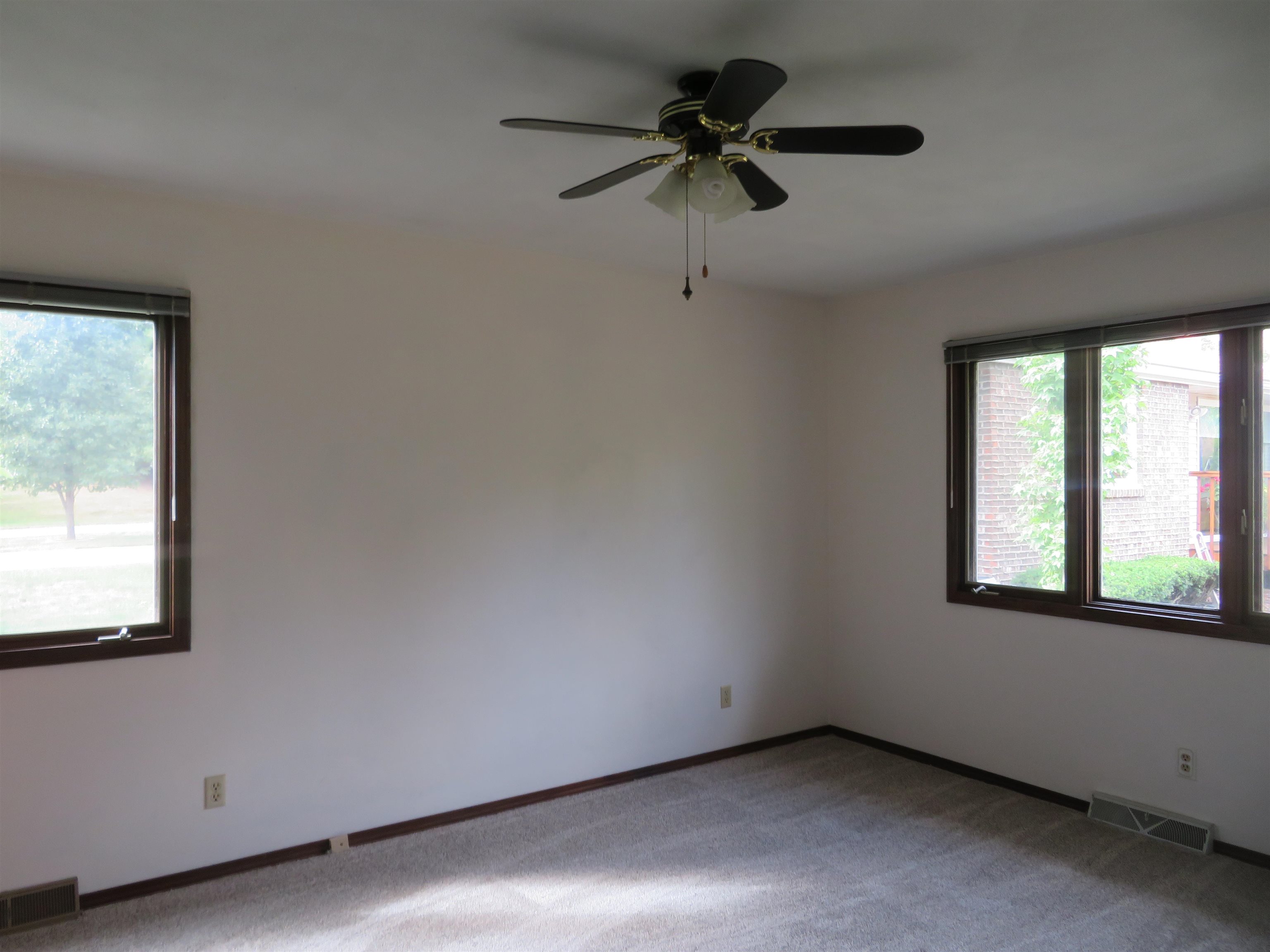 706 Quail Ridge Drive Freeport, IL 61032 - Photo 8 of 21 an empty room with a window