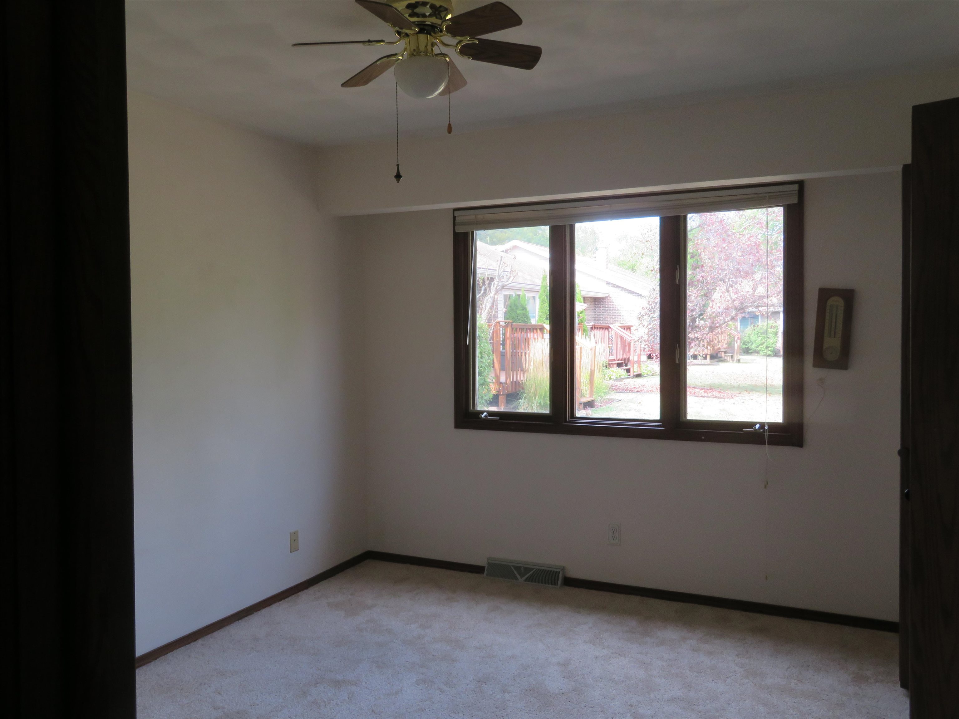 706 Quail Ridge Drive Freeport, IL 61032 - Photo 10 of 21 an empty room with a window