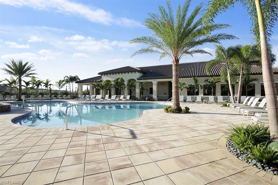 13338 Coronado Drive Naples, FL 34109 - Photo 11 of 19 a view of a swimming pool with a patio