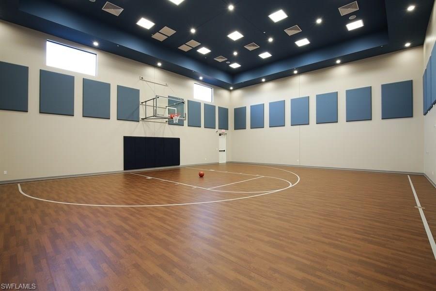 13338 Coronado Drive Naples, FL 34109 - Photo 15 of 19 a view of an empty room with wooden floor