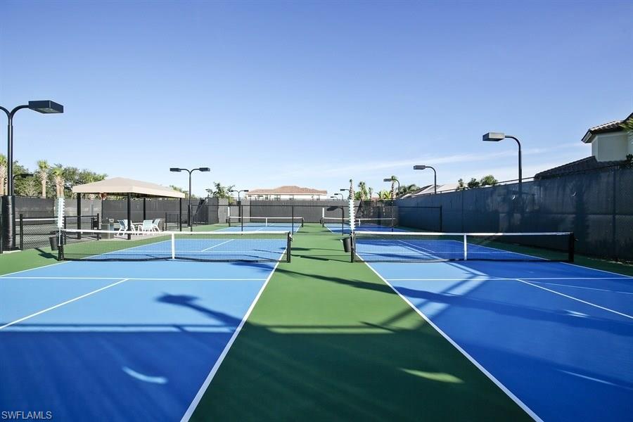 13338 Coronado Drive Naples, FL 34109 - Photo 18 of 19 a view of a tennis court