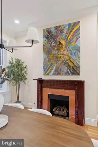 a view of an entryway with wooden floor