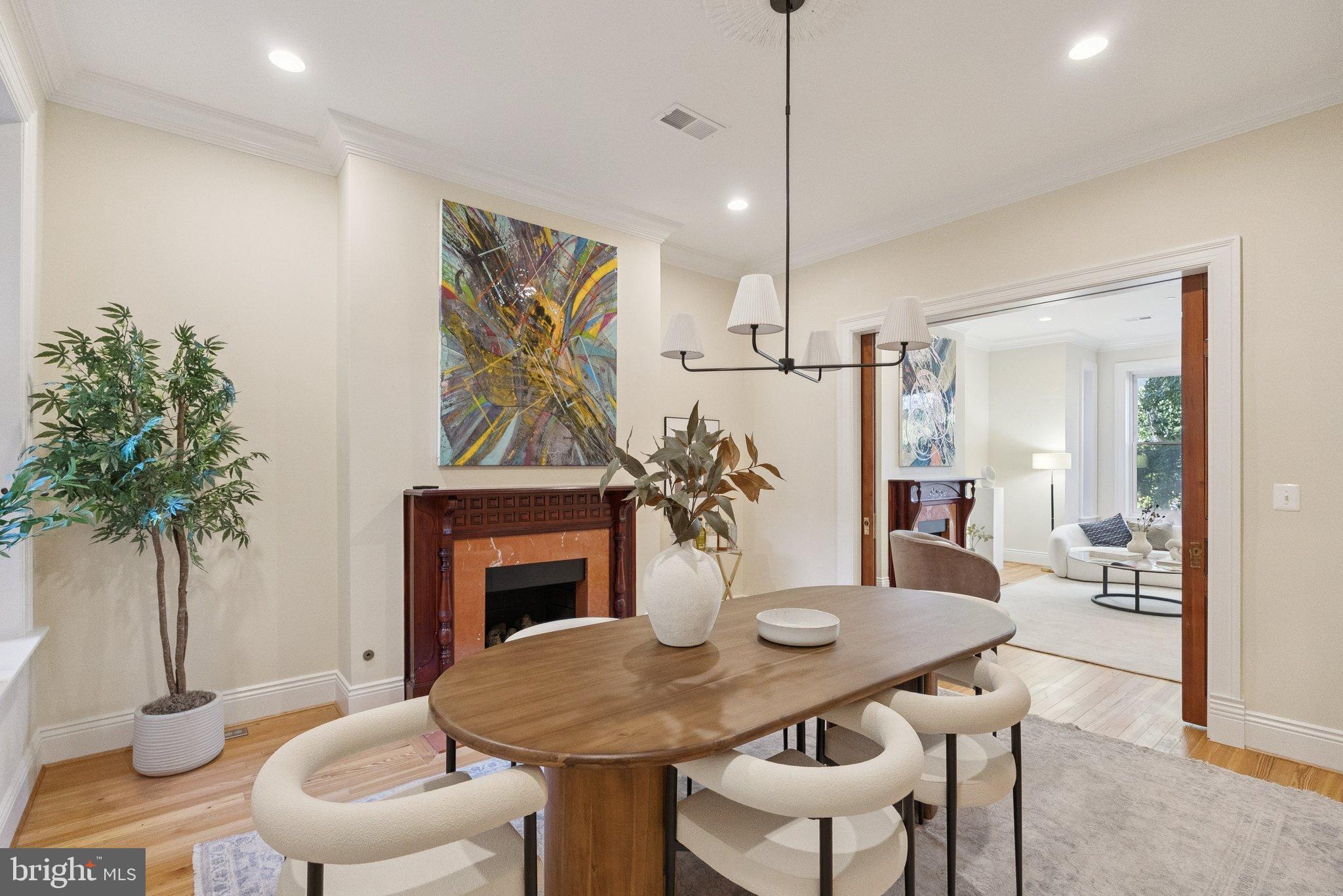 1514 R Street Northwest Washington, DC 20009 - Photo 12 of 84 a view of a dining room with furniture window and wooden floor