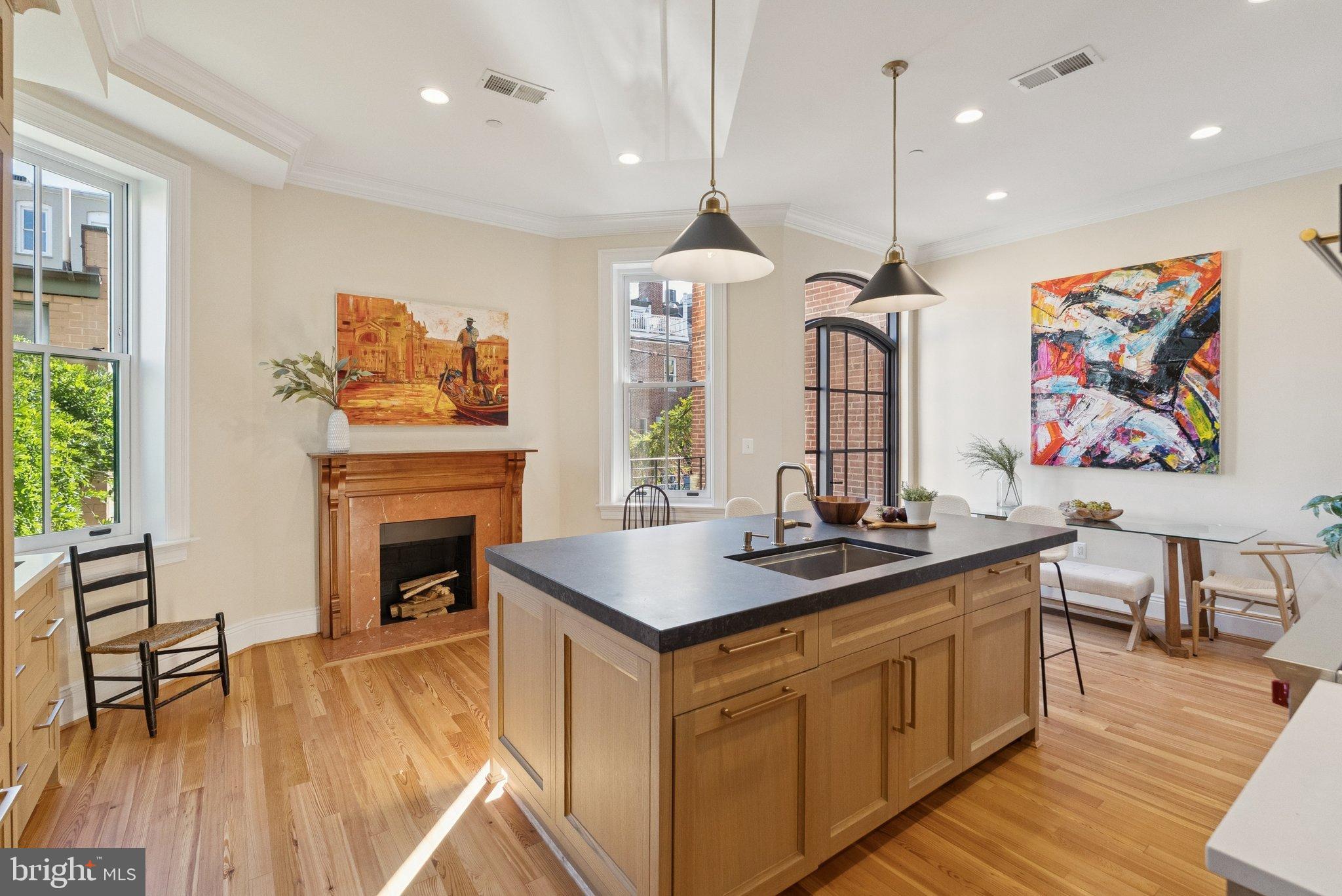 1514 R Street Northwest Washington, DC 20009 - Photo 20 of 84 Bright, modern kitchen with artistic flair.