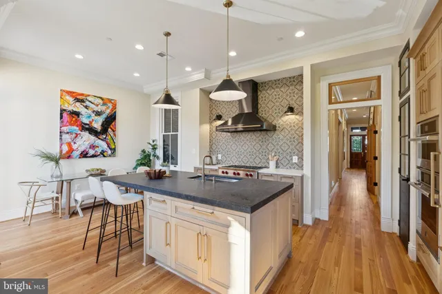 a living room with a couch and a fireplace