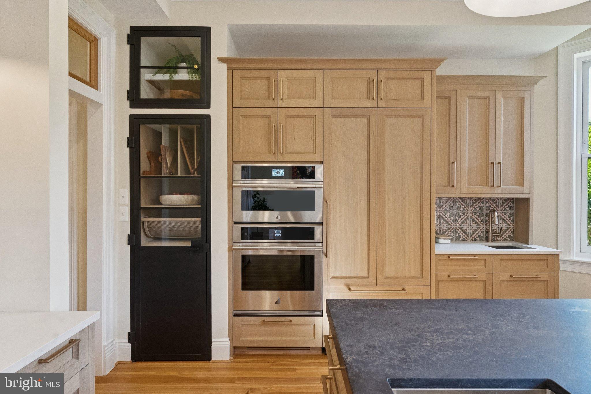 1514 R Street Northwest Washington, DC 20009 - Photo 24 of 84 Modern kitchen with sleek cabinetry design.