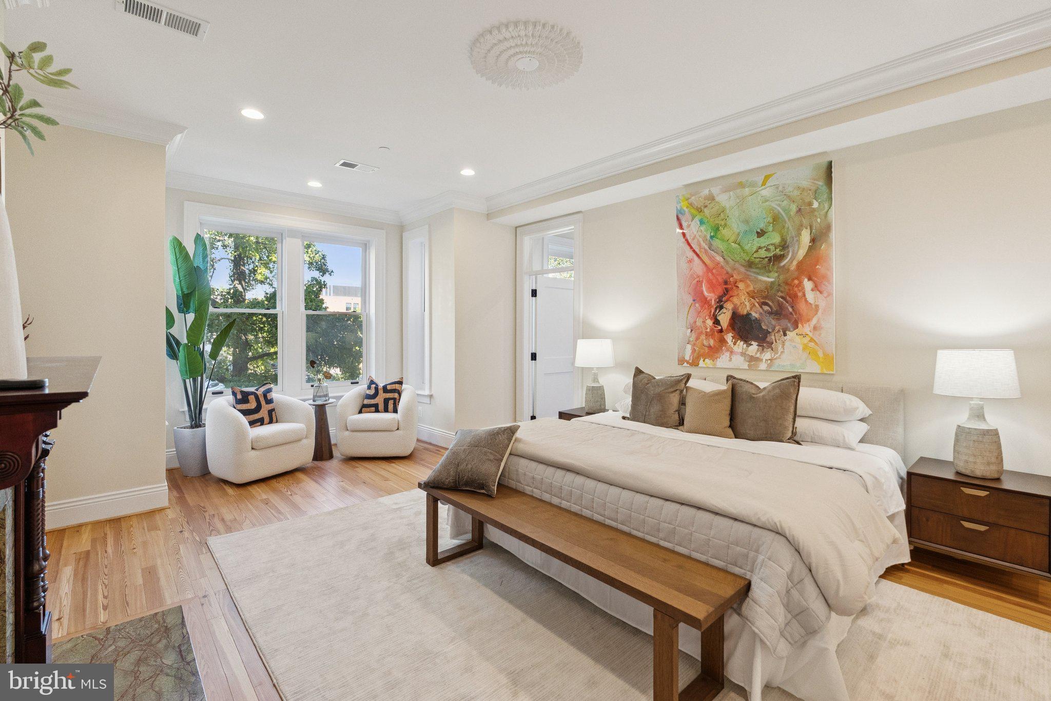 1514 R Street Northwest Washington, DC 20009 - Photo 28 of 84 a bedroom with a bed and wooden floor
