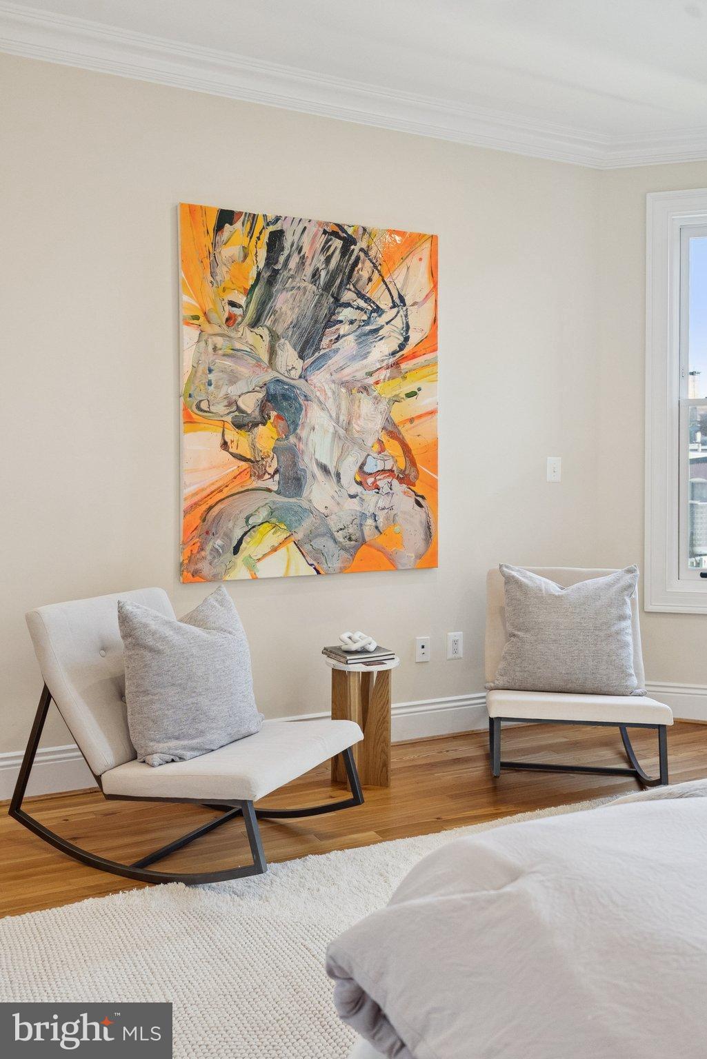 1514 R Street Northwest Washington, DC 20009 - Photo 39 of 84 Vibrant art enhances serene living space.