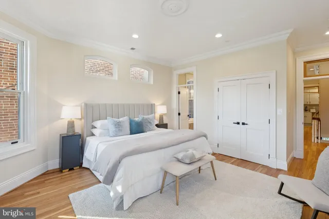 a view of a bathroom with a sink and a mirror