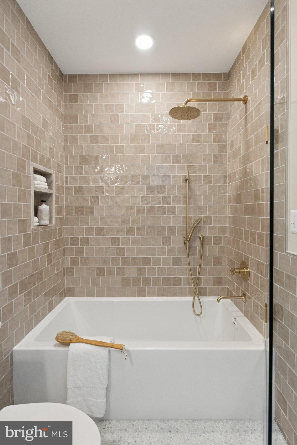 1514 R Street Northwest Washington, DC 20009 - Photo 42 of 84 a bathroom with a bathtub and a shower