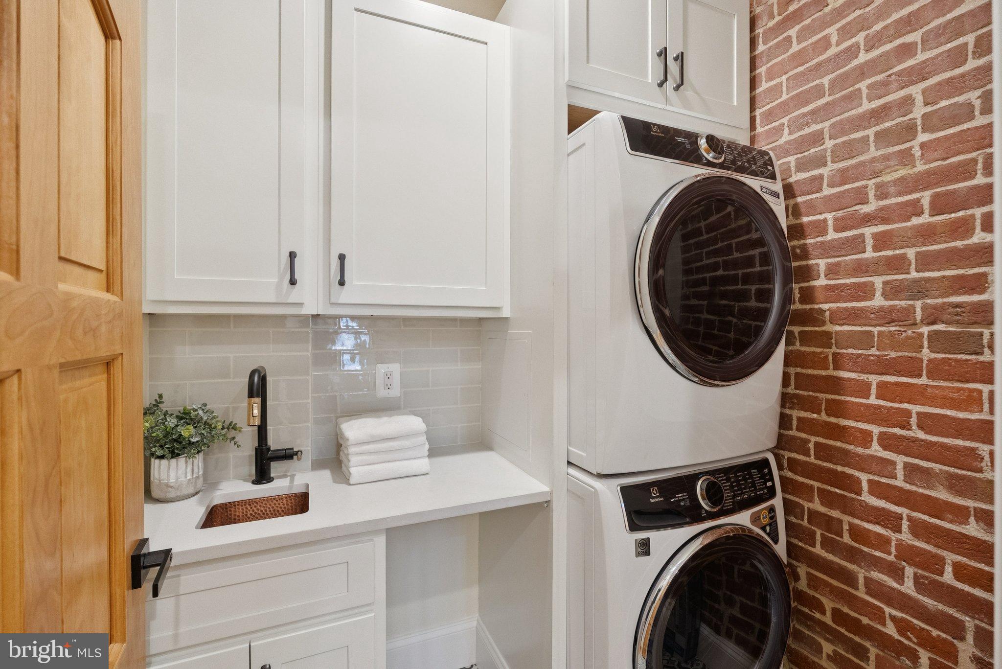 1514 R Street Northwest Washington, DC 20009 - Photo 45 of 84 a utility room with dryer and washer