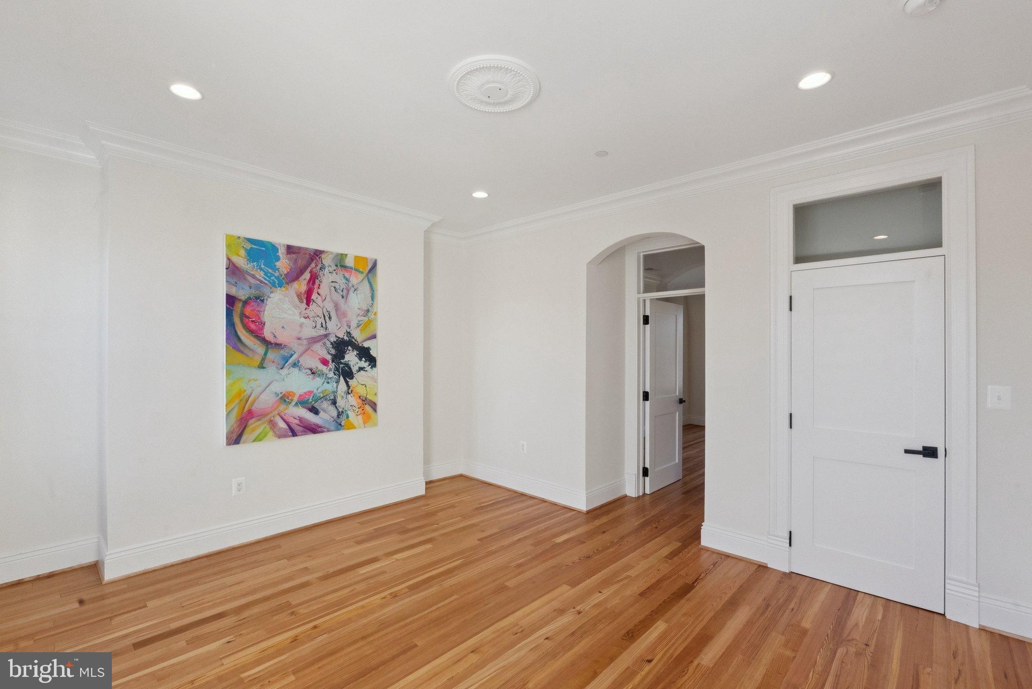 1514 R Street Northwest Washington, DC 20009 - Photo 47 of 84 Bright, airy space with vibrant artwork.