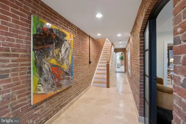 a front view of a house with iron fence