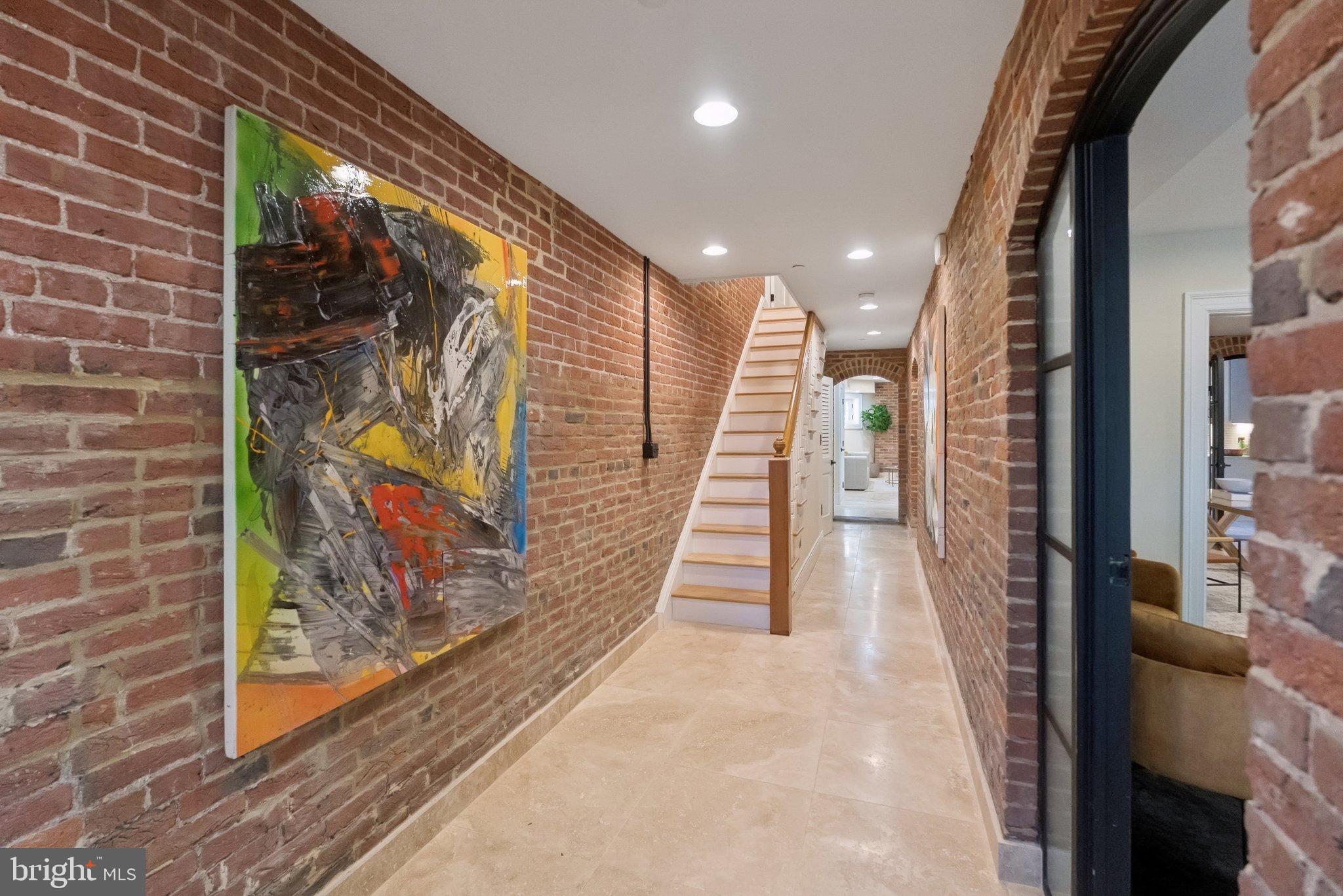 1514 R Street Northwest Washington, DC 20009 - Photo 50 of 84 a view of a hallway with wooden floor and staircase