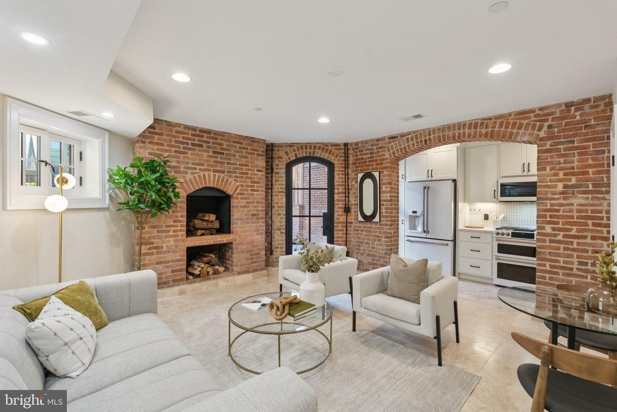 1514 R Street Northwest Washington, DC 20009 - Photo 60 of 84 a living room with furniture and a fireplace