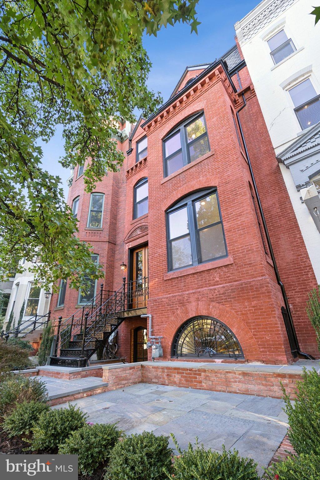 1514 R Street Northwest Washington, DC 20009 - Photo 80 of 84 a view of a brick building next to a yard