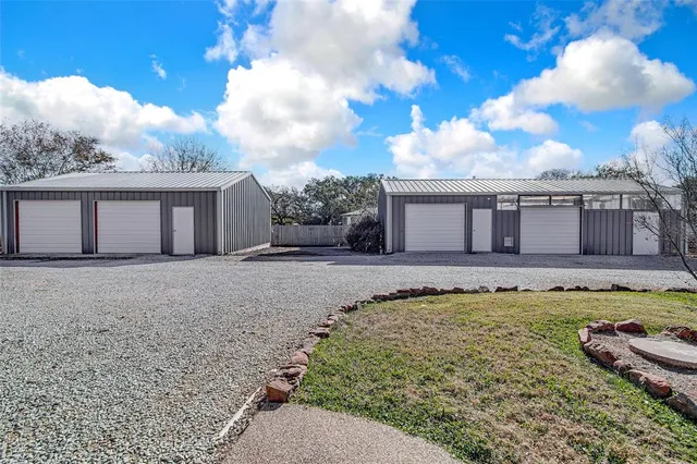 a view of a room with wooden floor and roof