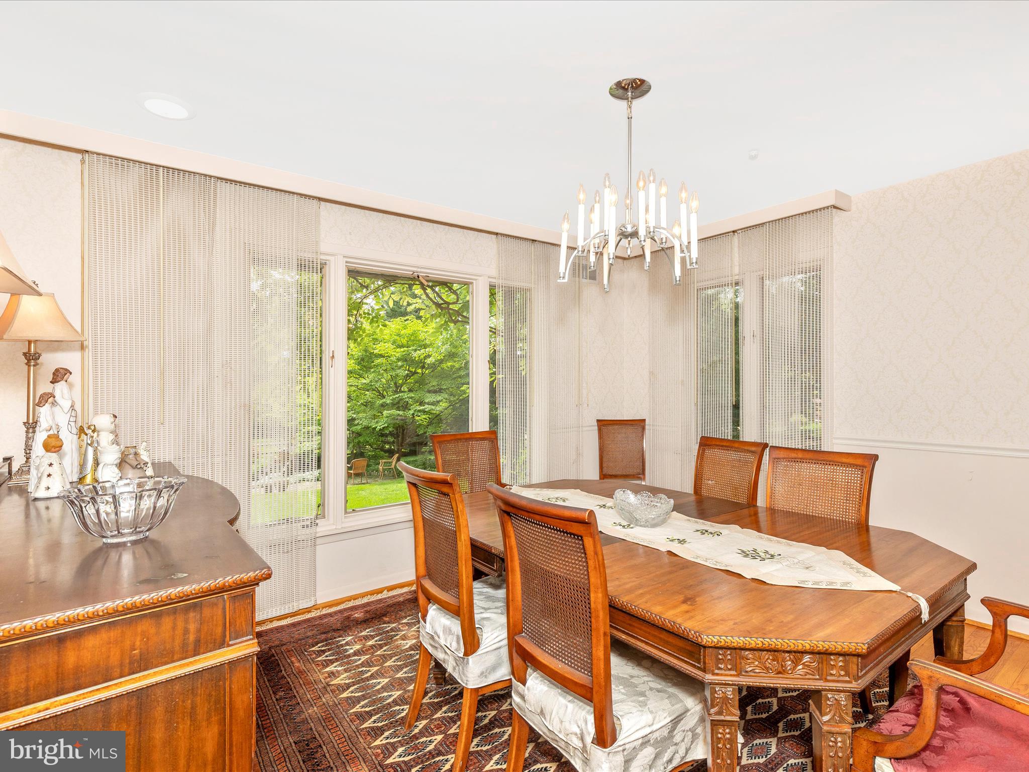 7903 Runnymeade Drive Frederick, MD 21702 - Photo 11 of 51 a view of a dining room with furniture window and outside view