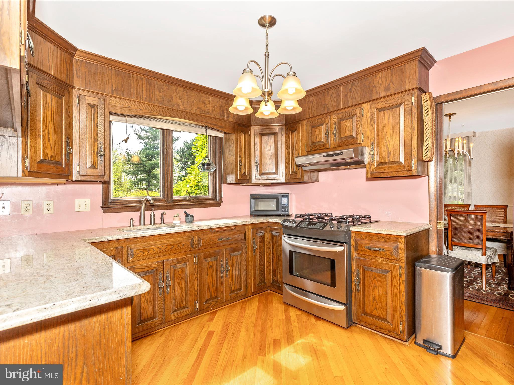7903 Runnymeade Drive Frederick, MD 21702 - Photo 16 of 51 a kitchen with stainless steel appliances granite countertop a sink a stove and a refrigerator
