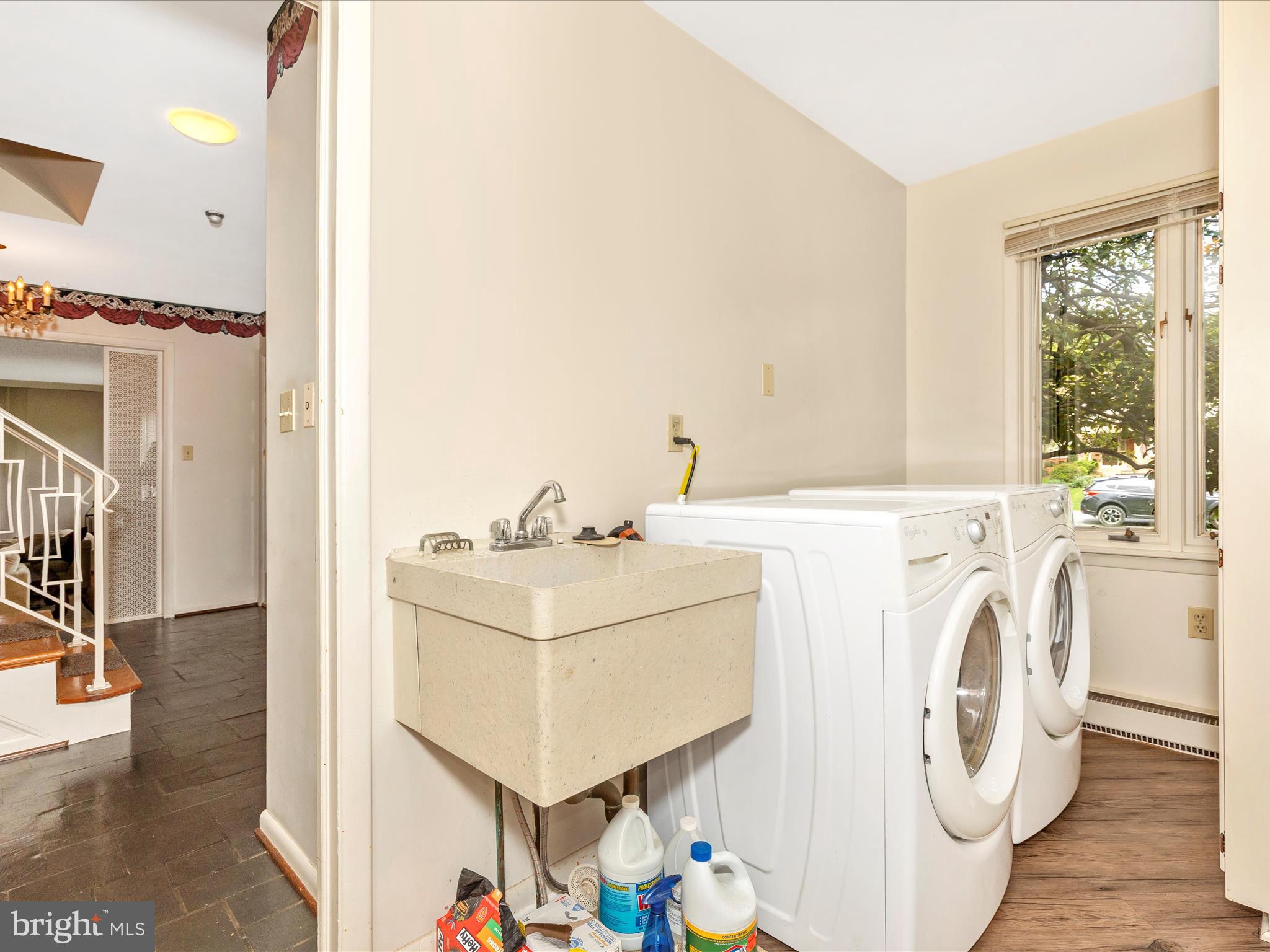 7903 Runnymeade Drive Frederick, MD 21702 - Photo 23 of 51 a utility room with dryer and washer