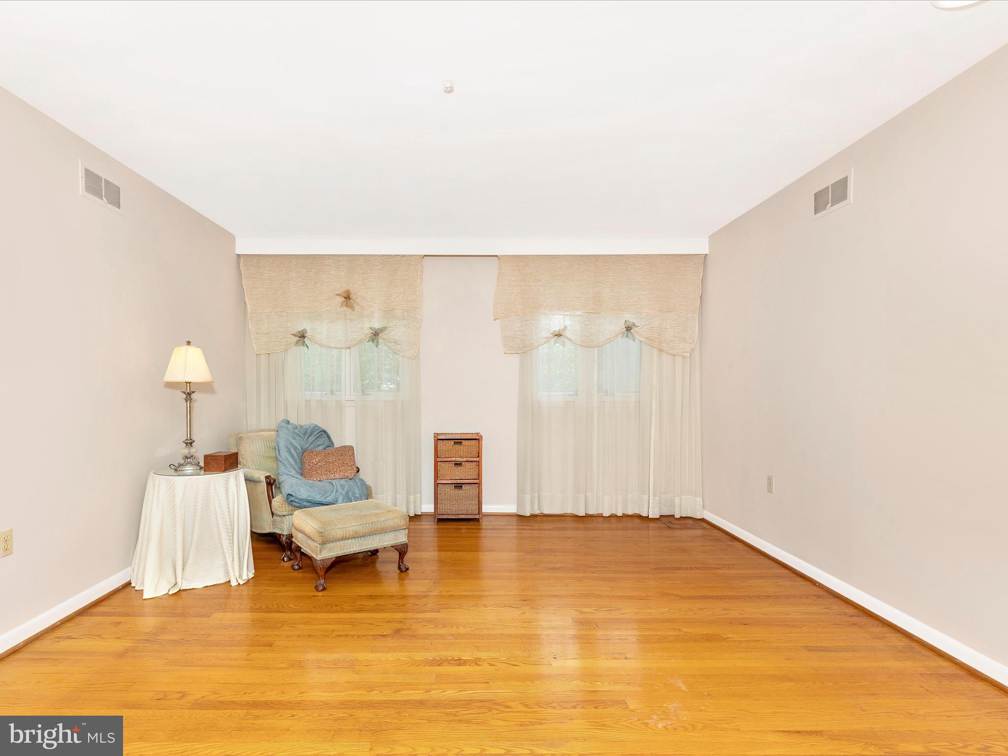 7903 Runnymeade Drive Frederick, MD 21702 - Photo 26 of 51 a living room with furniture and a table
