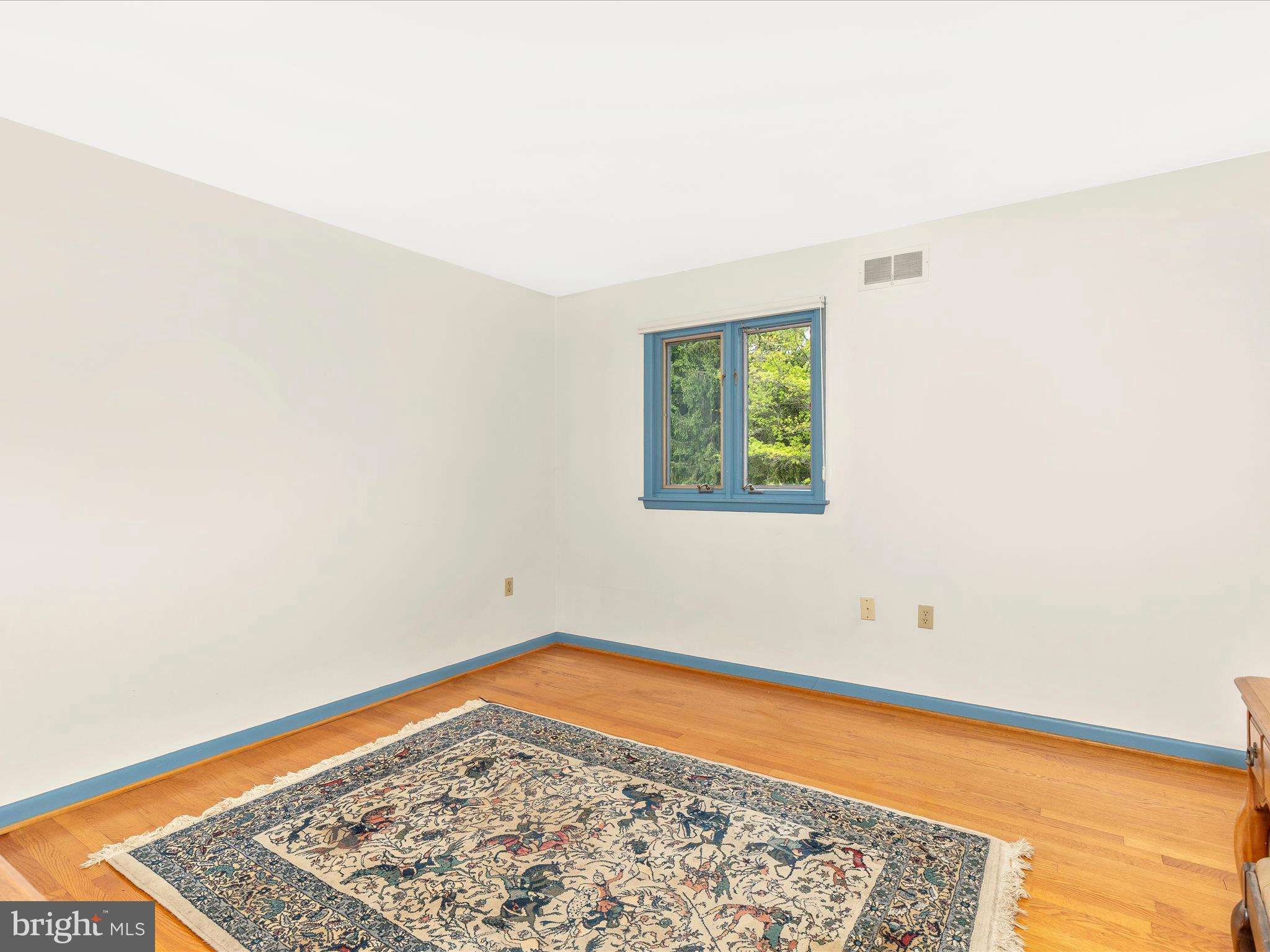 7903 Runnymeade Drive Frederick, MD 21702 - Photo 31 of 51 a view of a room with window and wooden floor