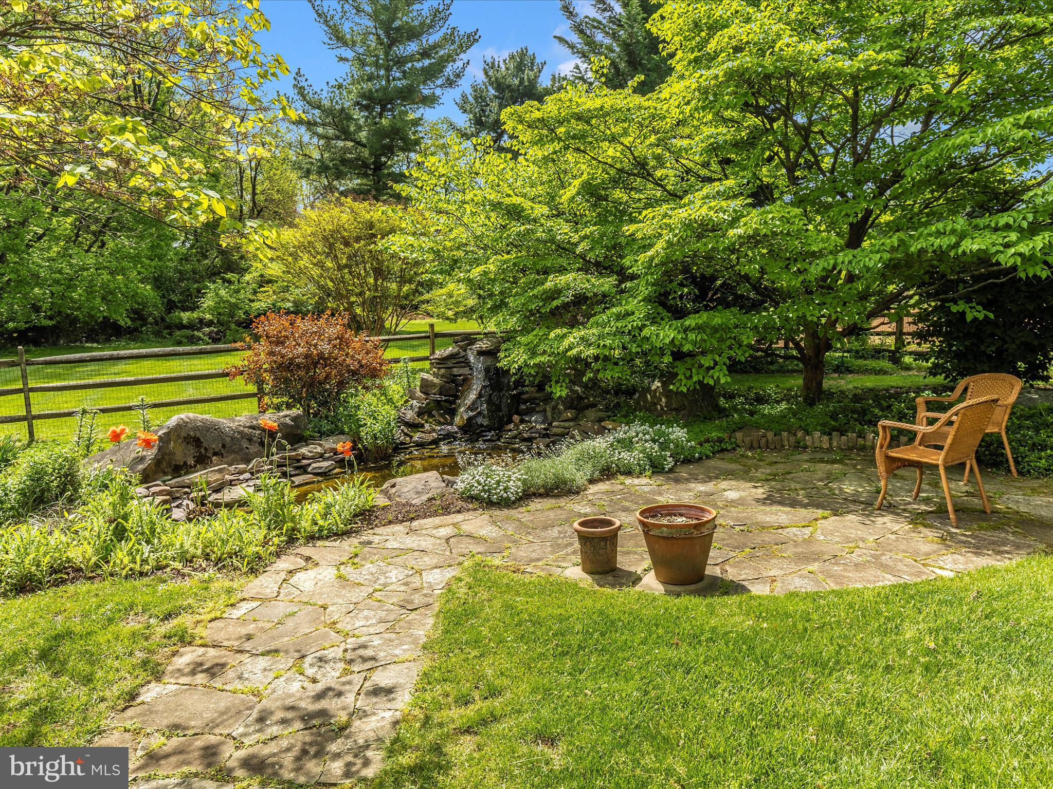 7903 Runnymeade Drive Frederick, MD 21702 - Photo 48 of 51 a backyard of a house with outdoor seating