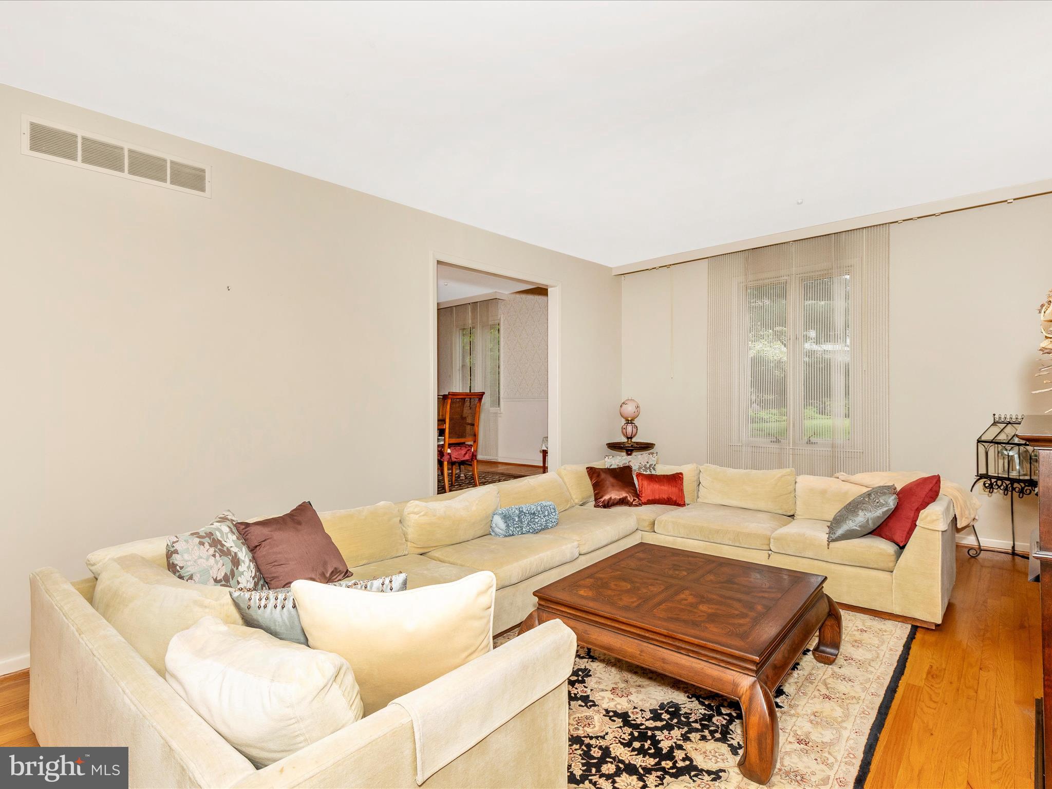 7903 Runnymeade Drive Frederick, MD 21702 - Photo 5 of 51 a living room with furniture and a window